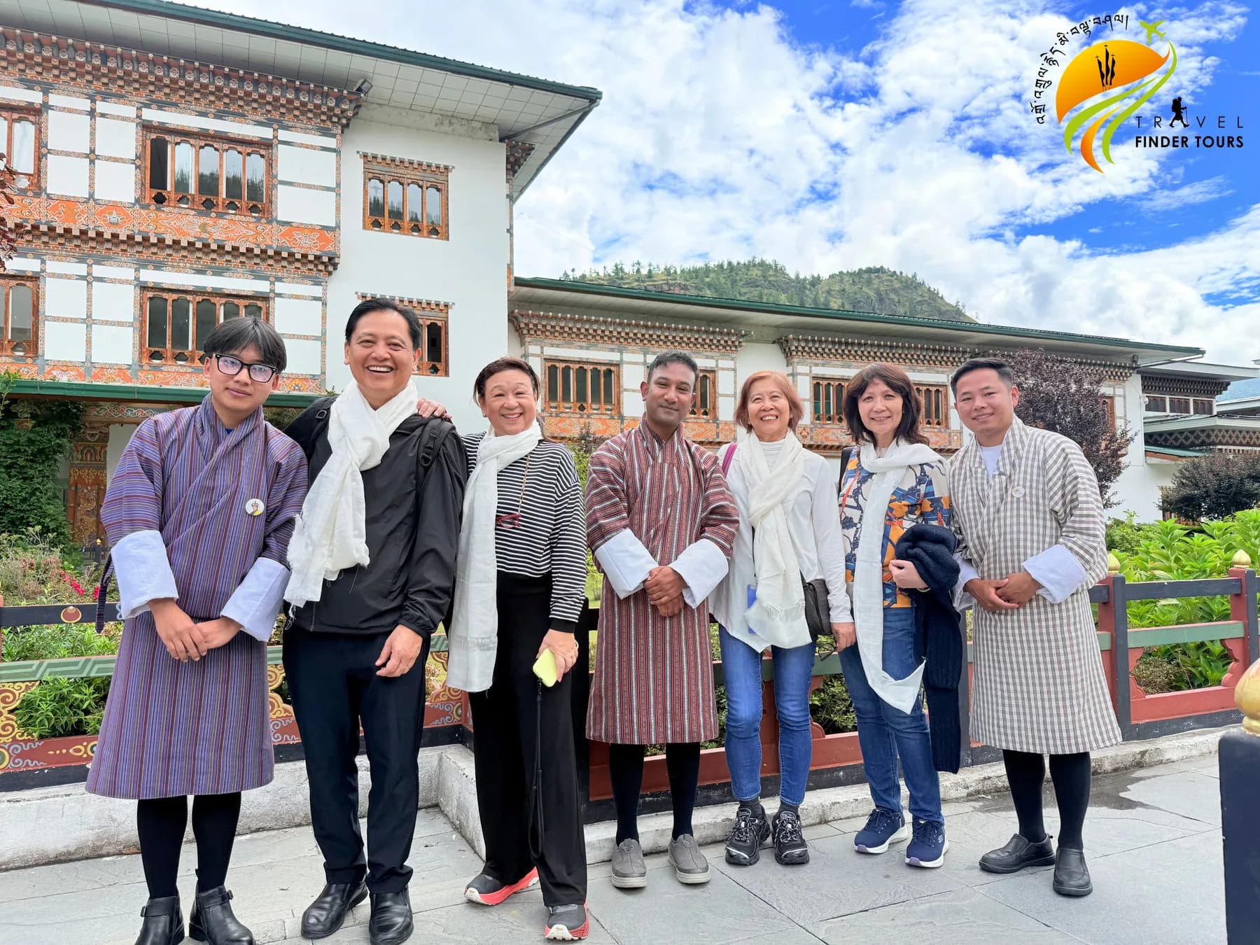 A group of guests in traditional Bhutanese surroundings