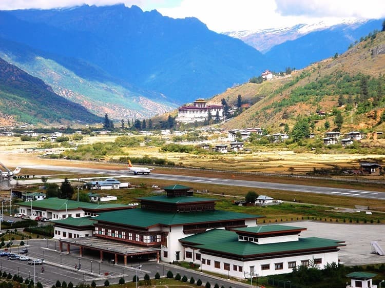 Wide Bhutanese valley with mountain landscape